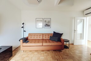 Departamento Deluxe, balcón, en el área del patio | Área de sala de estar