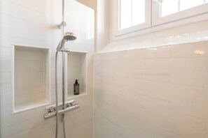 Shower, free toiletries, hair dryer, towels