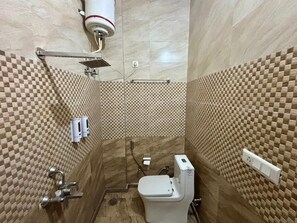 Shower, free toiletries, towels, soap