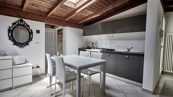 Appartement Deluxe, 3 chambres | Coin séjour