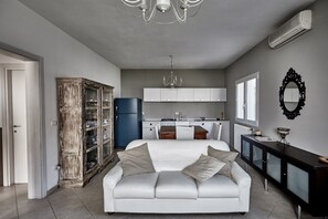 Appartement Supérieur, vue jardin | Coin séjour