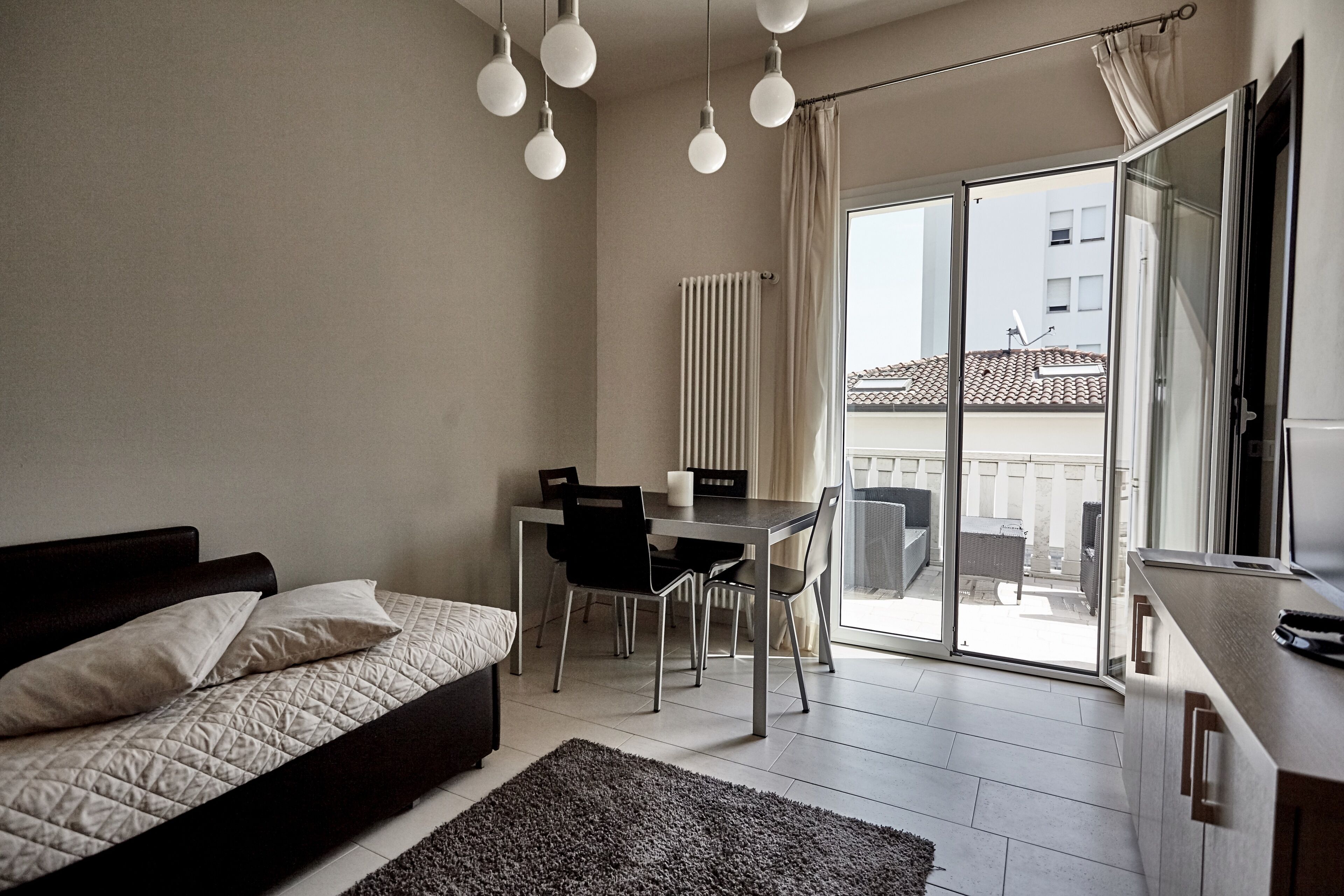 Superior Apartment, Balcony | Living area | Flat-screen TV