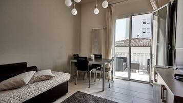 Superior Apartment, Balcony | Living area | Flat-screen TV