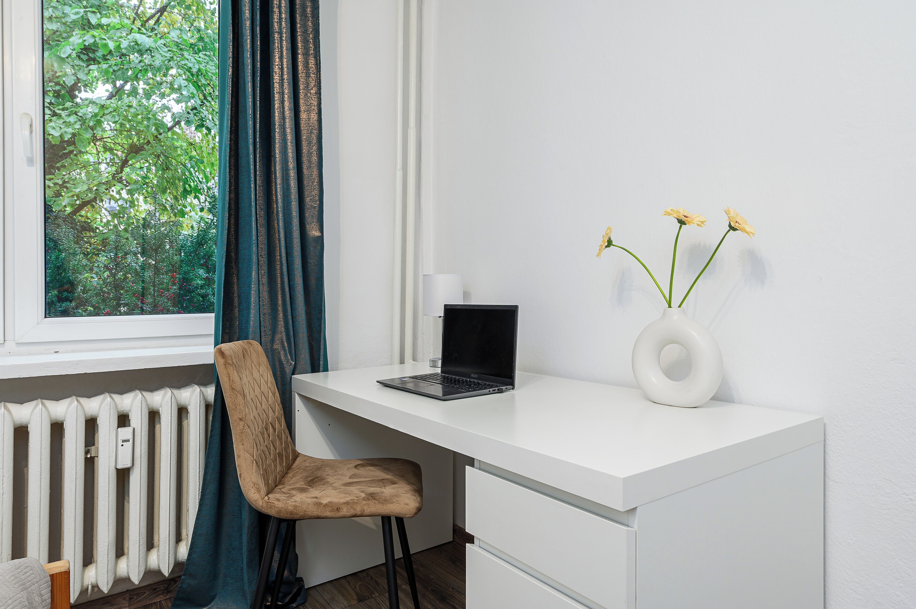 Desk, laptop workspace, blackout curtains, iron/ironing board