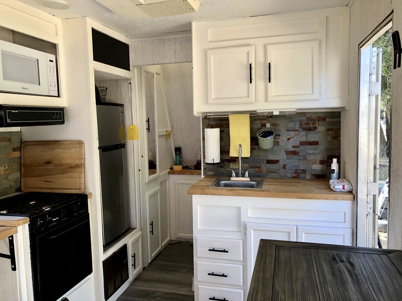 Fridge, stovetop, coffee/tea maker, cookware/dishes/utensils