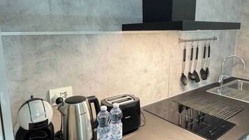 Forno, piano cottura, lavastoviglie, carta assorbente