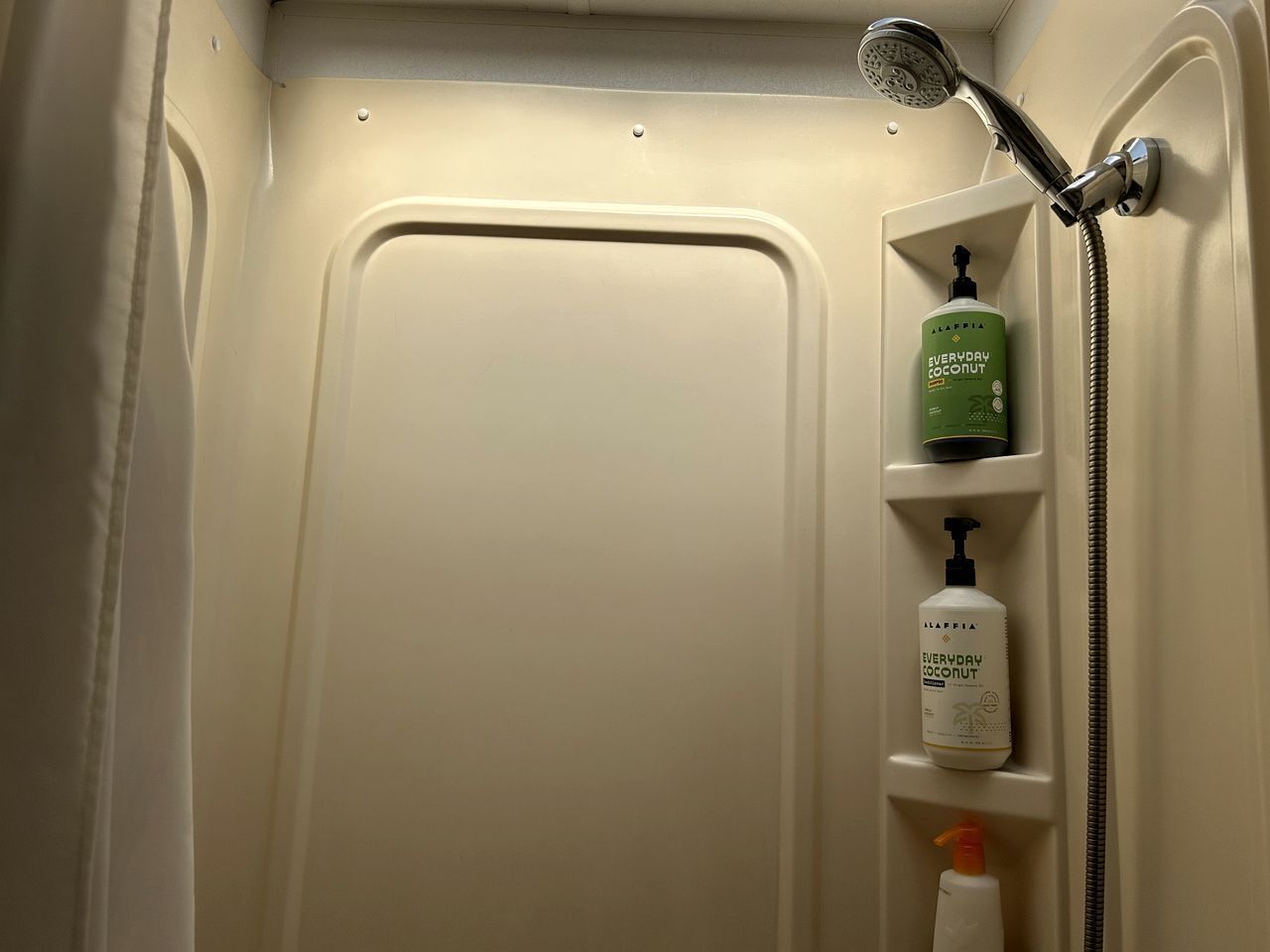 Hair dryer, towels, soap, shampoo
