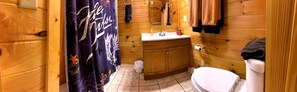Jetted tub, hair dryer, towels, toilet paper