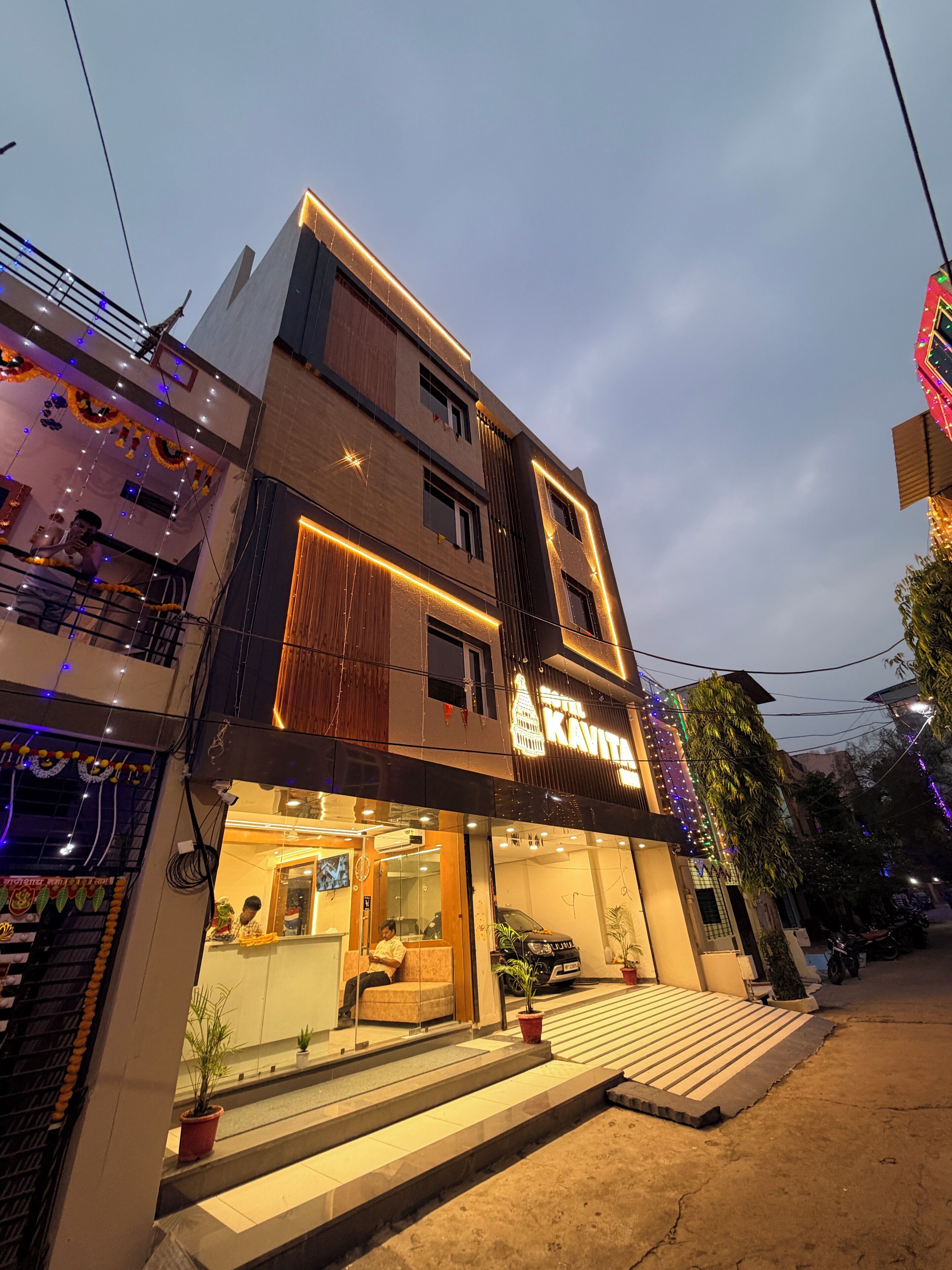 A modern building with a prominent sign reading "KAVITA".