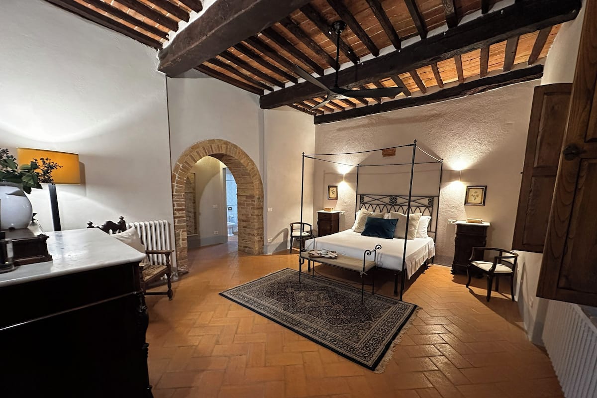 Departamento Deluxe, vista al jardín | Caja de seguridad en la habitación, cortinas blackout y wifi gratis