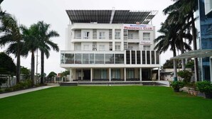 A modern building with a sign for 'Bulbana Urban Residency Club'. - BULDHANA URBAN RESIDENCY CLUB (Buldana)