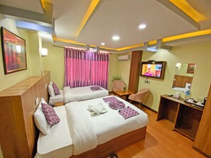 Deluxe Twin Room, City View | Desk, laptop workspace, free WiFi