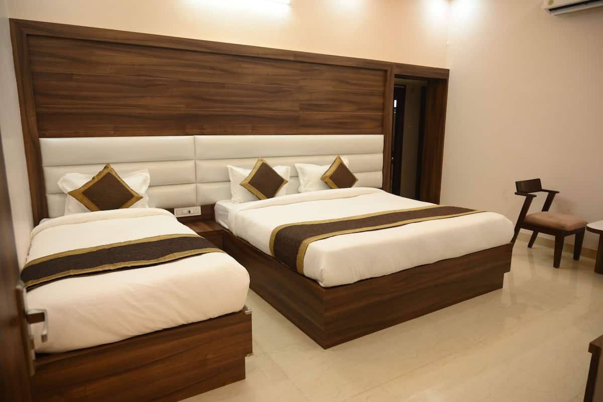 Habitación Deluxe | Espacio para trabajar con un portátil, wifi gratis, ropa de cama