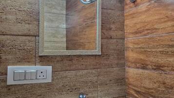 Shower, free toiletries, slippers, towels