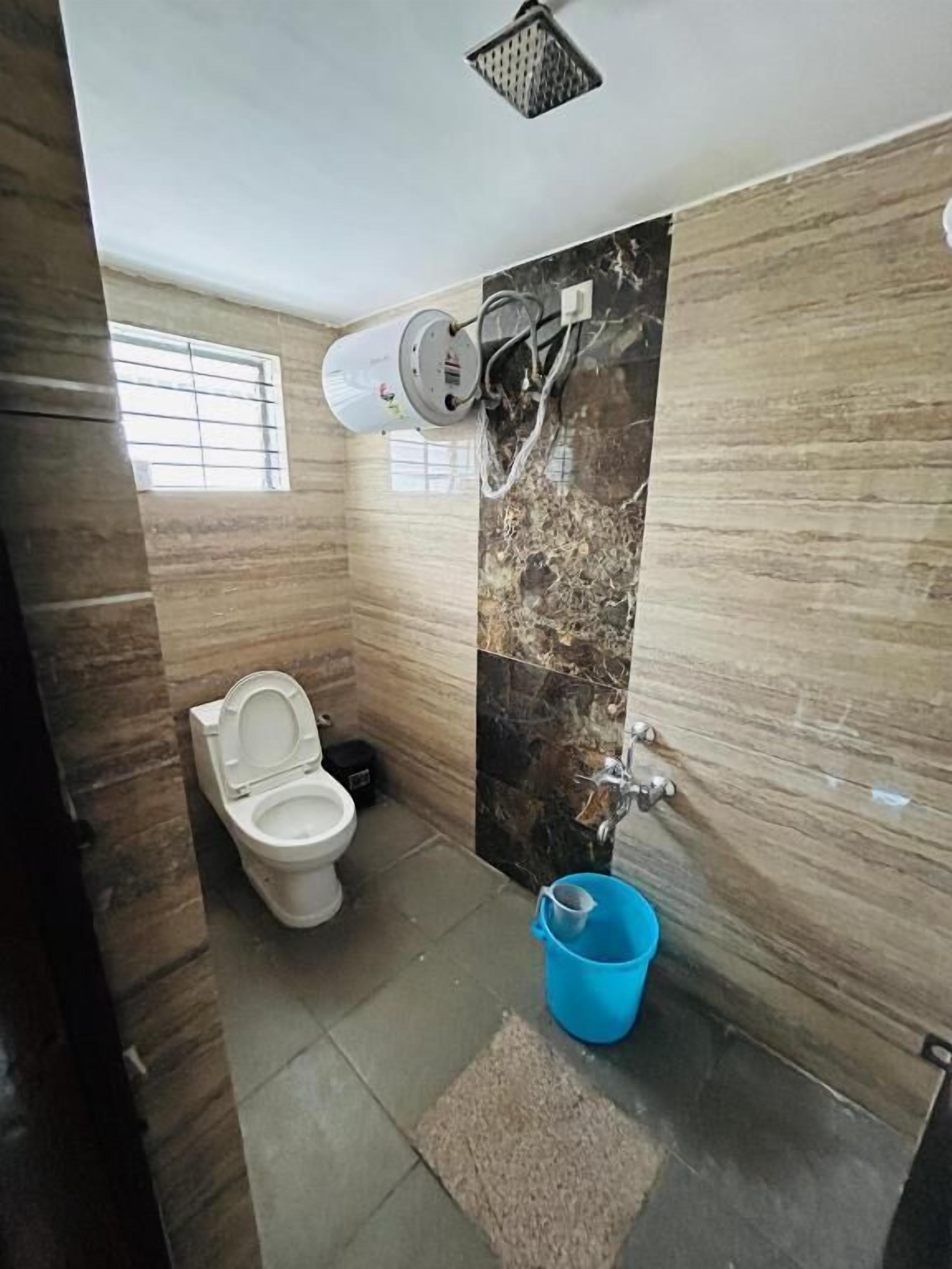 Shower, bathrobes, slippers, towels