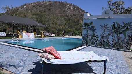 2 outdoor pools. JHAR ARRAVLI RESORT