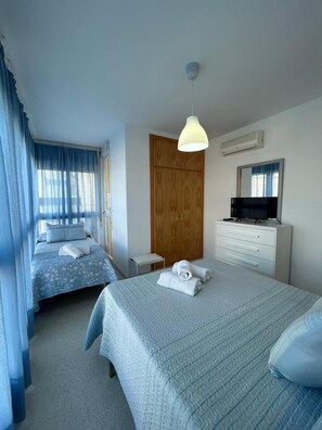 مكواة/لوح كي وملاءات أسرّة