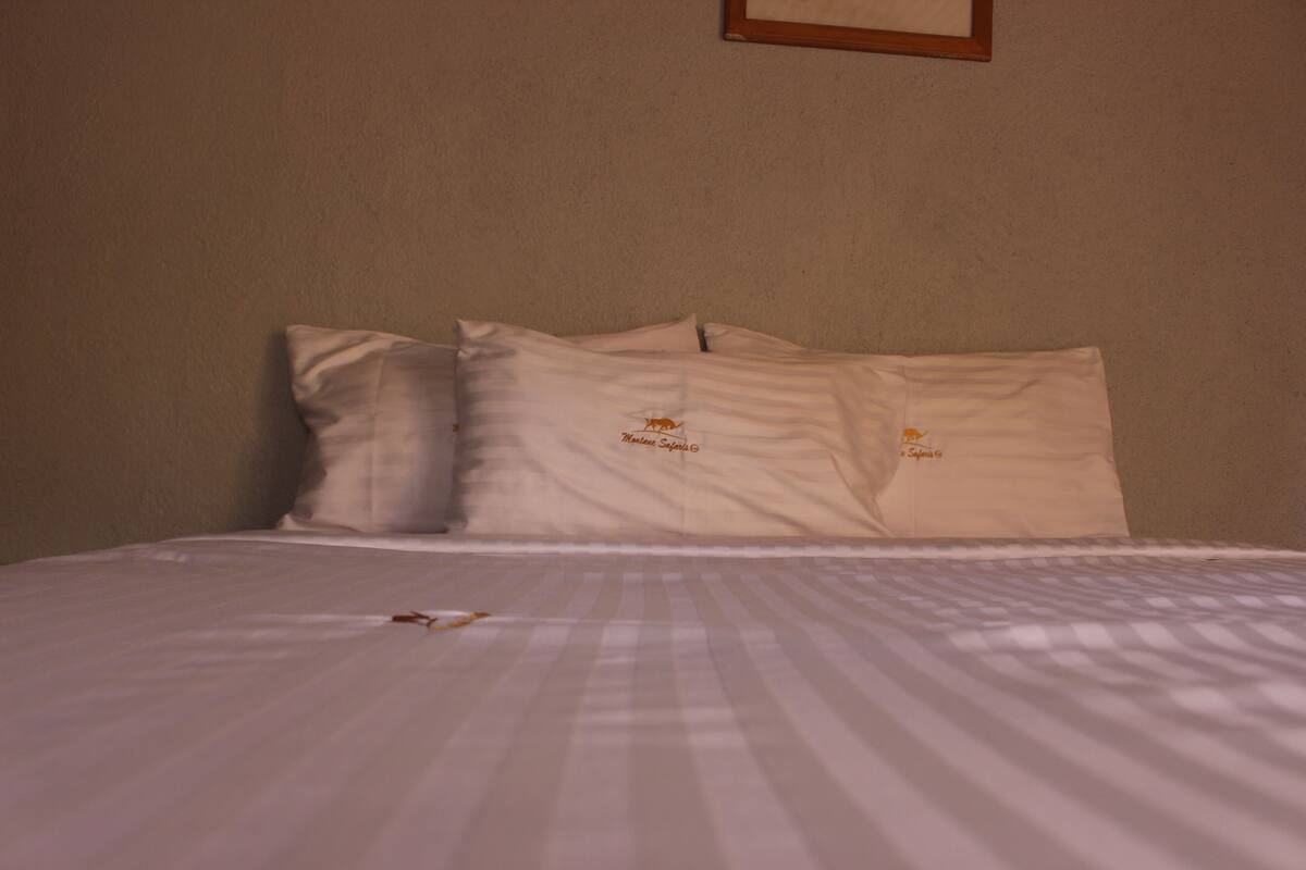 Premium bedding, pillowtop beds, desk, laptop workspace