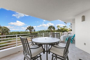 Outdoor dining - Beachfront Walk-Out Condo with Pool - Easy Access to Pool and Beach (Marco Island)