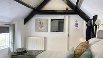 Classic Quadruple Room, Courtyard View | Desk, laptop workspace, blackout drapes, iron/ironing board