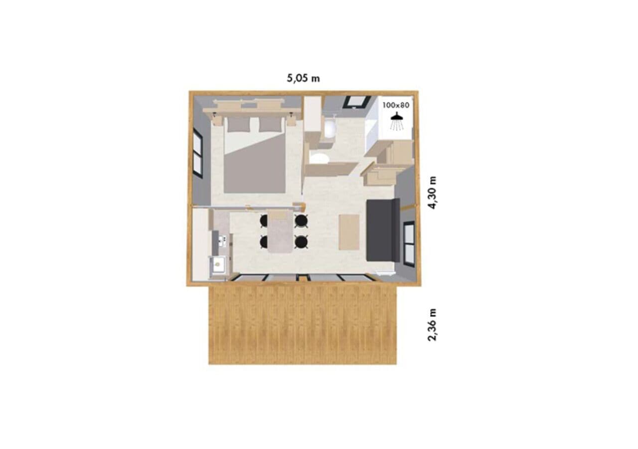 Ein 5,05 m x 4,30 m großes Zimmer mit Küchenbereich, Esstisch und einer kleinen Sitzecke.