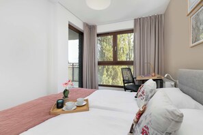 1 غرفة نوم ومكتب ومكواة/لوح كي وسرير سفر