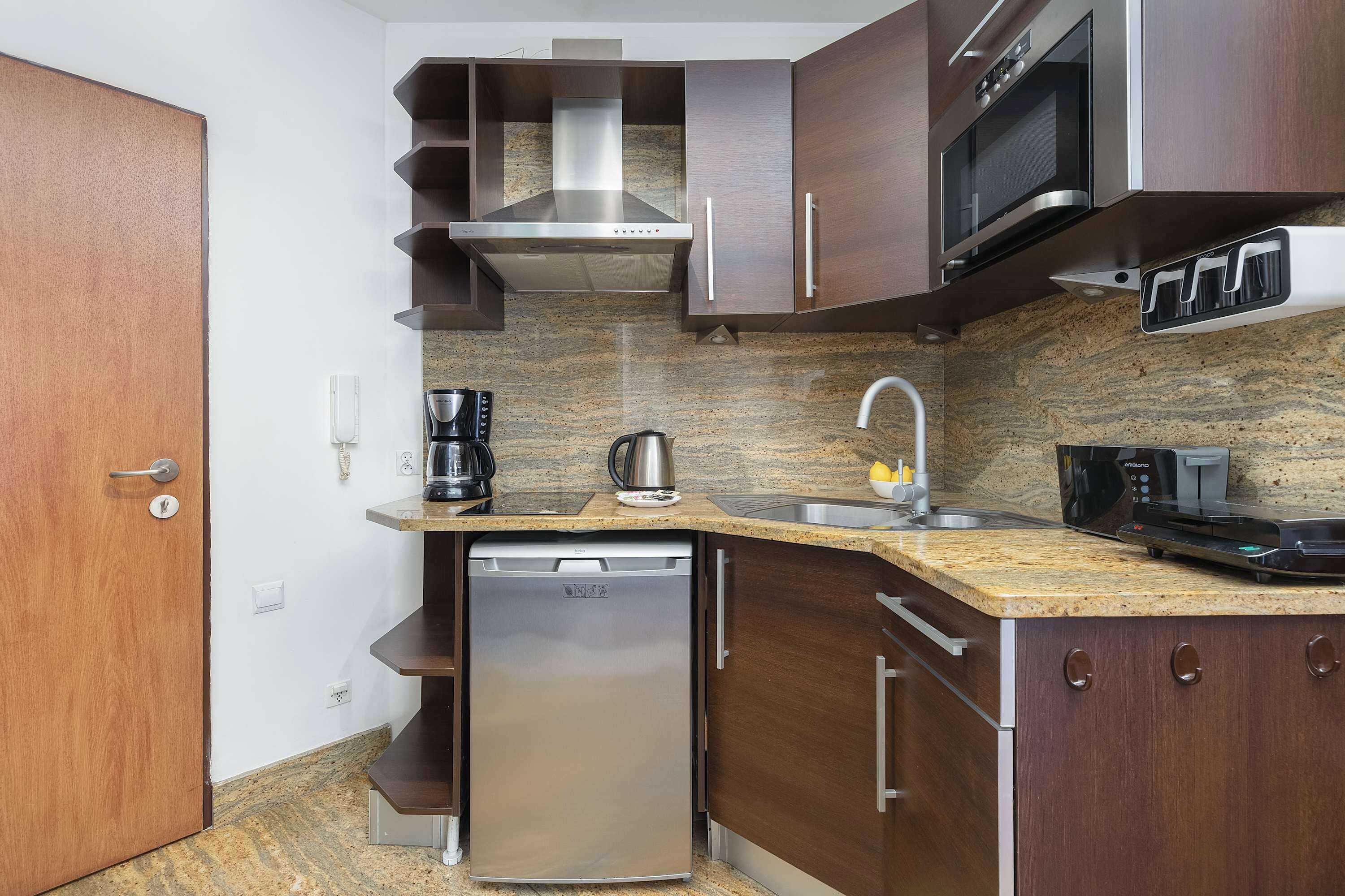 Fridge, microwave, coffee/tea maker, toaster