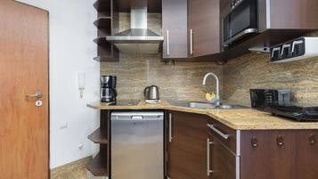 Fridge, microwave, coffee/tea maker, toaster