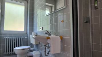 Double Room | Bathroom | Shower, towels, toilet paper