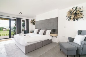 Habitación doble Deluxe | Tabla de planchar con plancha