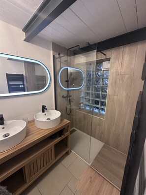 Shower, hair dryer, towels, soap