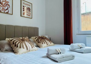 1 habitación, tabla de planchar con plancha, wifi gratis y ropa de cama 