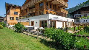 Exterior - Apartment Camelia hosted by More Mountain, Morzine | Beautiful Garden Apartment with Outdoor Jacuzzi in central Morzine. Opposite the Super Morzine Telecabine with 4 double/twin bedrooms and bunk room, you cannot beat this for size and location. (Morzine)