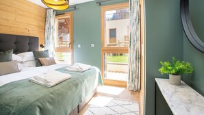 5 bedrooms, iron/ironing board, travel cot, free WiFi - Apartment Camelia hosted by More Mountain, Morzine | Beautiful Garden Apartment with Outdoor Jacuzzi in central Morzine. Opposite the Super Morzine Telecabine with 4 double/twin bedrooms and bunk room, you cannot beat this for size and location. (Morzine)