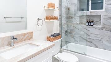 Shower, hair dryer, towels, soap