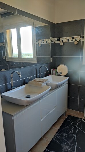 Shower, hair dryer, towels, soap