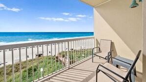 A balcony with a view of the beach and ocean. - 4TH FLOOR! GREAT DECOR! OUTSTANDING VIEWS! (Panama City Beach)