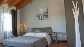 Triple Room, 1 Bedroom, Private Bathroom, Garden View | Down comforters, pillowtop beds, individually decorated