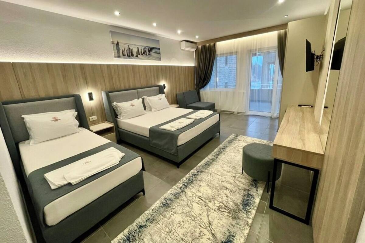 Classic Triple Room, Balcony | Desk, free WiFi