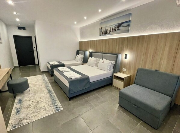 Classic Triple Room, Balcony | Desk, free WiFi