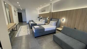 Premium bedding, desk, blackout curtains, soundproofing