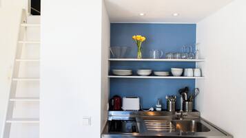 Fridge, stovetop, electric kettle, toaster