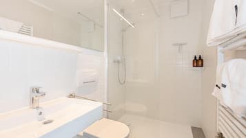 Hair dryer, towels, soap, shampoo