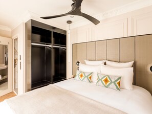 Hypo-allergenic bedding, pillow-top beds, in-room safe