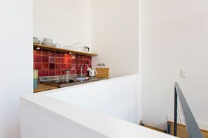 Fridge, stovetop, electric kettle, toaster