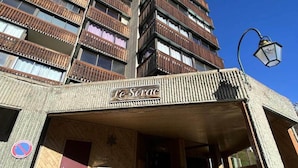 A building with a sign reading "Le Serac" above the entrance. - VAL Thorens Rental: Studio Cabin at the top of the Resort (Les Belleville)