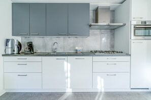 Casa | Cozinha privada | Cadeirão de bebê