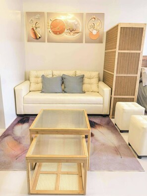 Condo, 1 Bedroom, Accessible, Balcony | Living room - Modern Comfort in Paradise Condo at Verdant Palawan (Puerto Princesa)