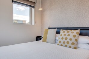 1 bedroom, laptop workspace, iron/ironing board, bed sheets