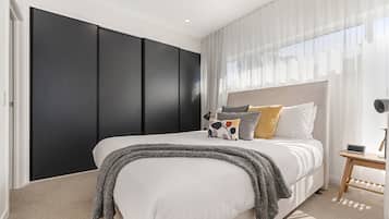 4 bedrooms, laptop workspace, iron/ironing board, bed sheets